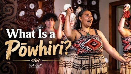 Māori performers in traditional woven attire performing a pōwhiri welcome ceremony with poi inside a carved wharenui.