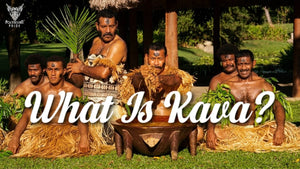 Fijian men preparing yaqona in a traditional wooden bowl during a cultural ceremony